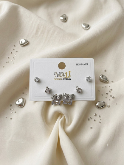 1 carot celeste Bow Studs