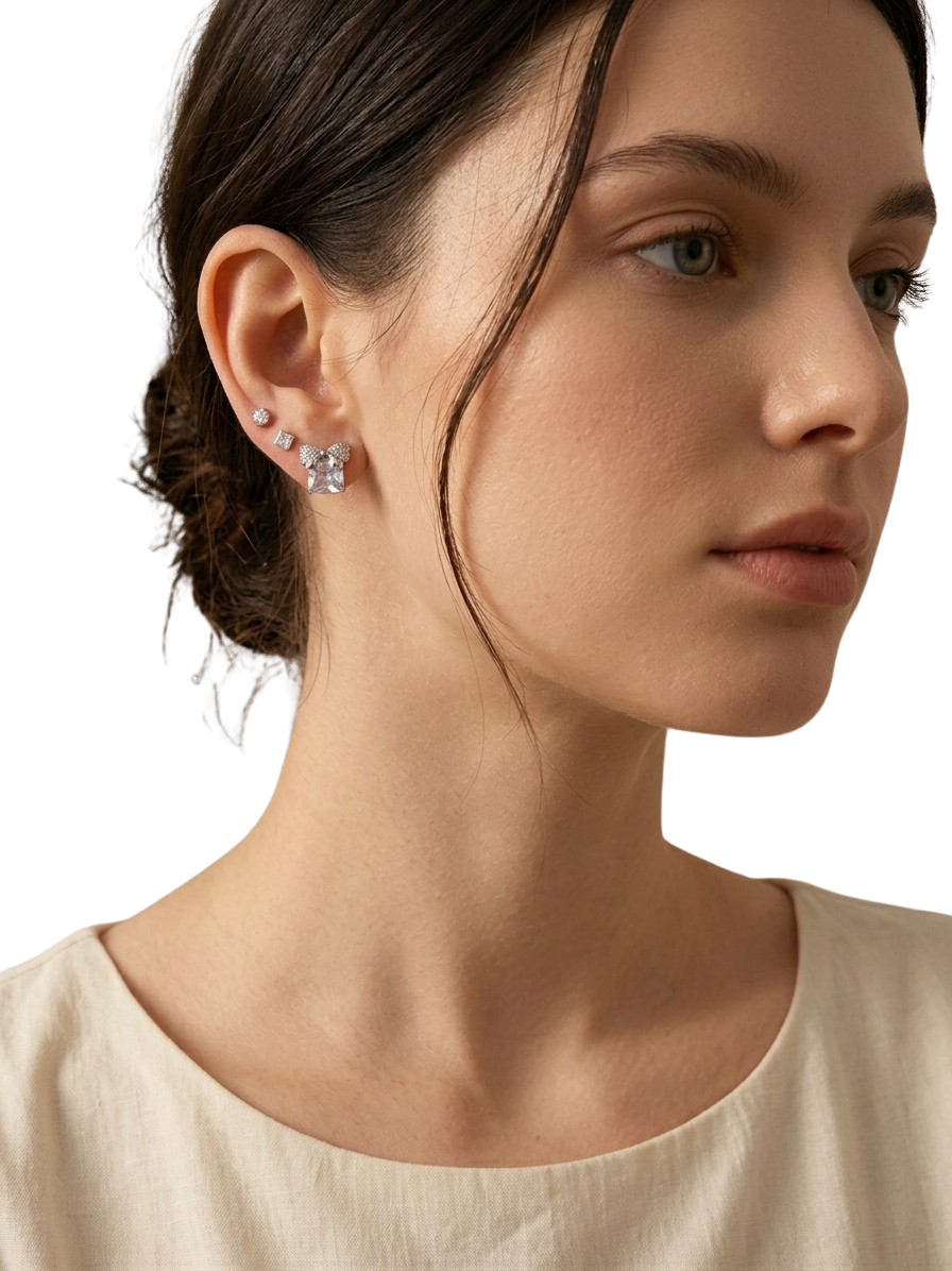 1 carot celeste Bow Studs